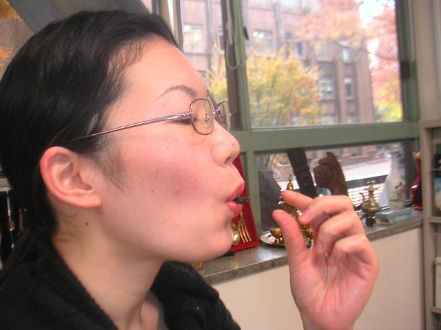 30JapaneseClass/Yoshiko_eating_bug.jpg